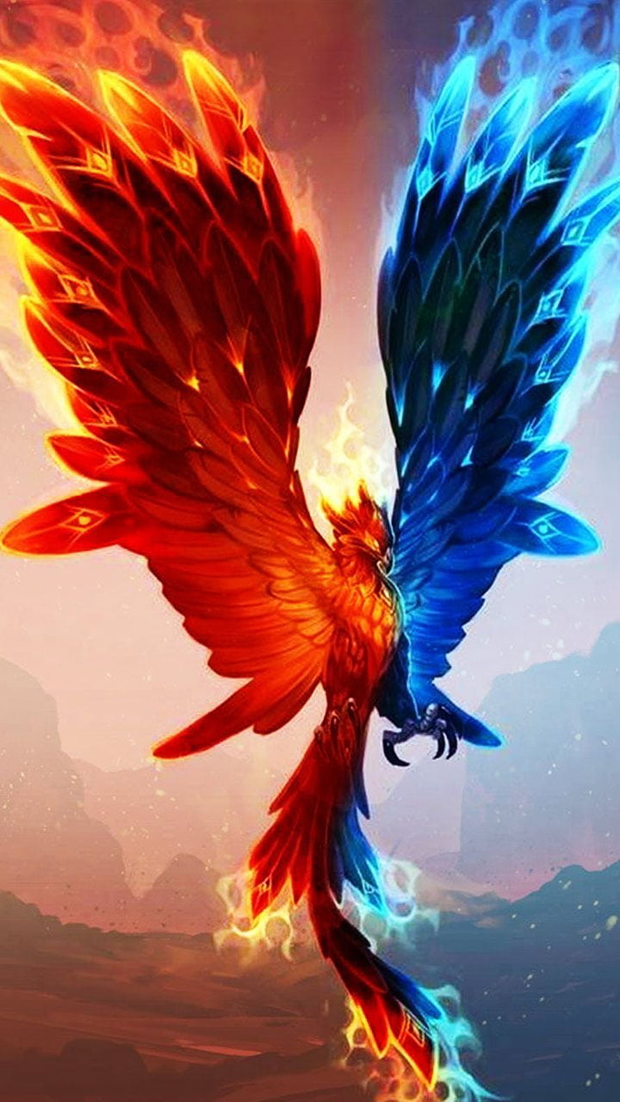 Mystical Dual-Element Phoenix with Fire and Ice Wings Soaring Over Mountains HD phone wallpaper