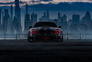 Dodge Charger SRT Hellcat Enforcer Rear View Against Moody City Skyline HD wallpaper