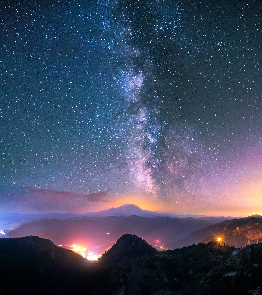 Milky Way Galaxy Rising Over Mountain Ranges at Twilight with City Lights HD phone wallpaper