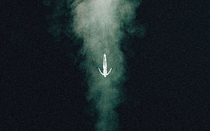 Ethereal White Figure Floating in Dark Green Misty Void HD wallpaper