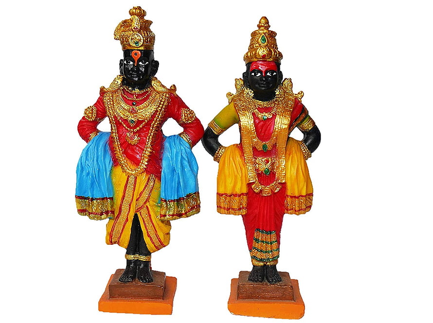 Vishnu and Lakshmi Hindu Deity Statues in Traditional Attire HD wallpaper