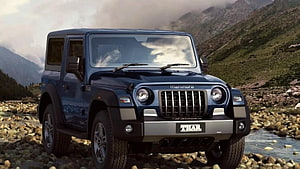 Mahindra Thar Blue SUV Off-Road Adventure in Mountainous Terrain HD wallpaper