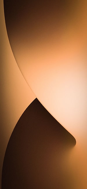 Abstract Minimalist Wallpaper with Warm Amber Gradient and Dark Geometric Shapes HD phone wallpaper