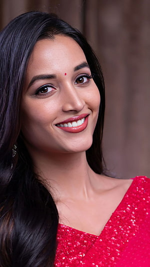 Tanya Abrol in a Sparkling Red Sequin Dress Portrait HD phone wallpaper