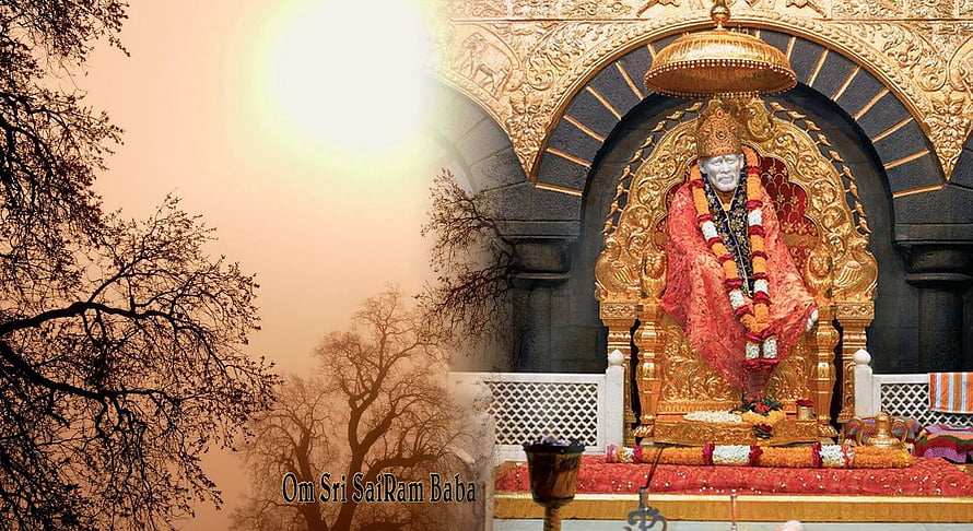 Sri Sai Ram Baba statue seated on golden throne in temple shrine with garlands and sunset background HD wallpaper