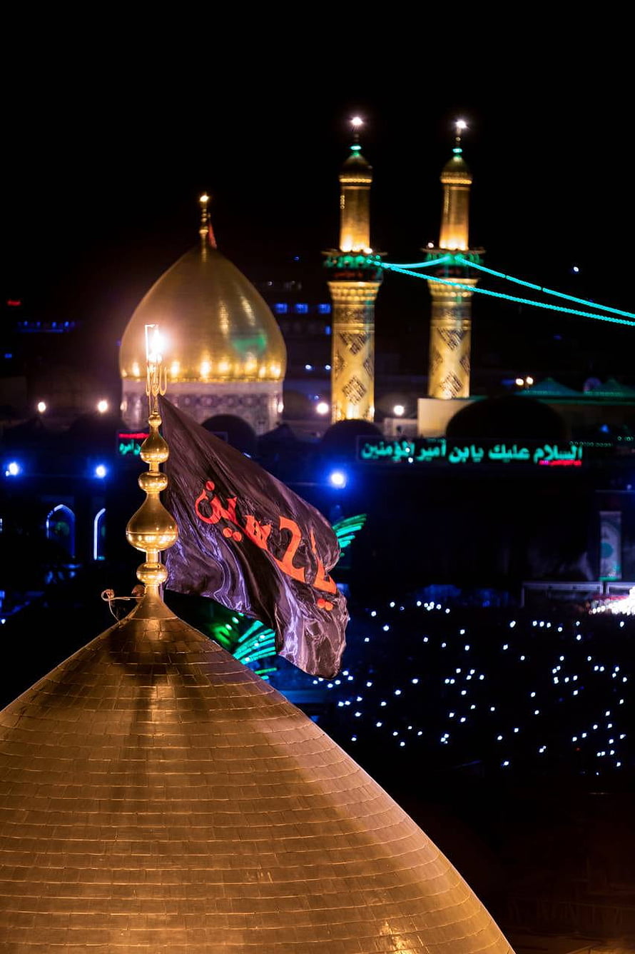 Karbala Shrine at Night with Golden Domes and Minarets Illuminated HD phone wallpaper