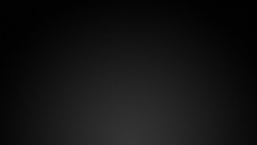 Minimalist Dark Gradient Background with Subtle Vignette and Soft Center Glow HD wallpaper