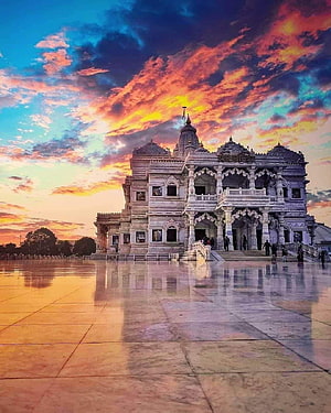 BAPS Swaminarayan Akshardham Temple at Sunset with Vibrant Clouds and Reflections HD phone wallpaper