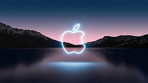 Glowing Apple Logo Over Misty Mountain Lake at Twilight HD wallpaper