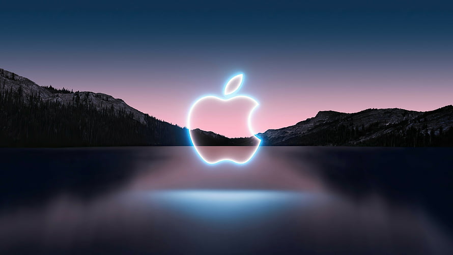 Glowing Apple Logo Over Misty Mountain Lake at Twilight HD wallpaper