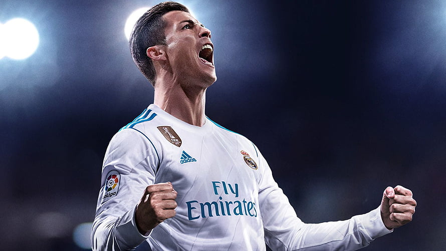 Cristiano Ronaldo in Real Madrid Kit Celebrating with Fists Clenched Under Stadium Lights HD wallpaper