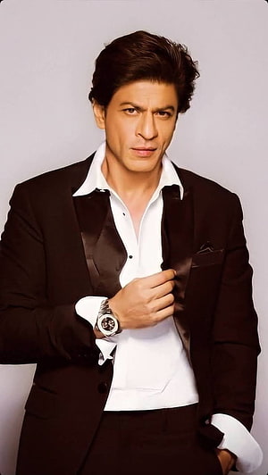 Shah Rukh Khan in a Black Tuxedo Suit with White Shirt and Luxury Watch HD phone wallpaper