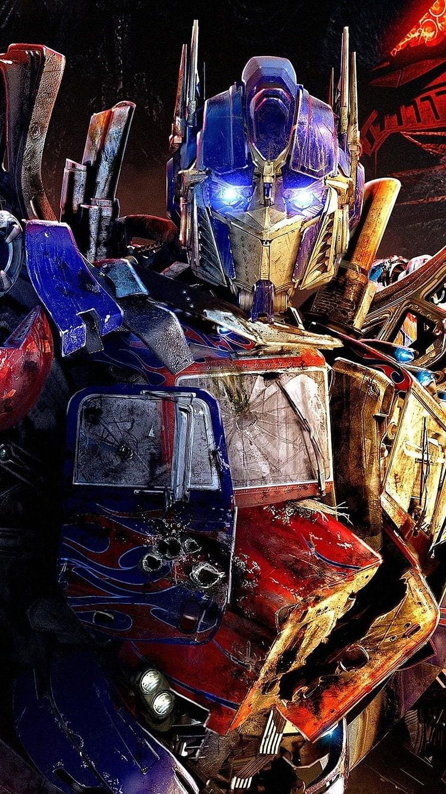 Battle-Worn Optimus Prime Close-Up with Glowing Blue Eyes and Rusted Armor HD phone wallpaper