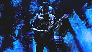 Musician Playing Electric Guitar On Stage With Blue Smoke And Hat HD wallpaper