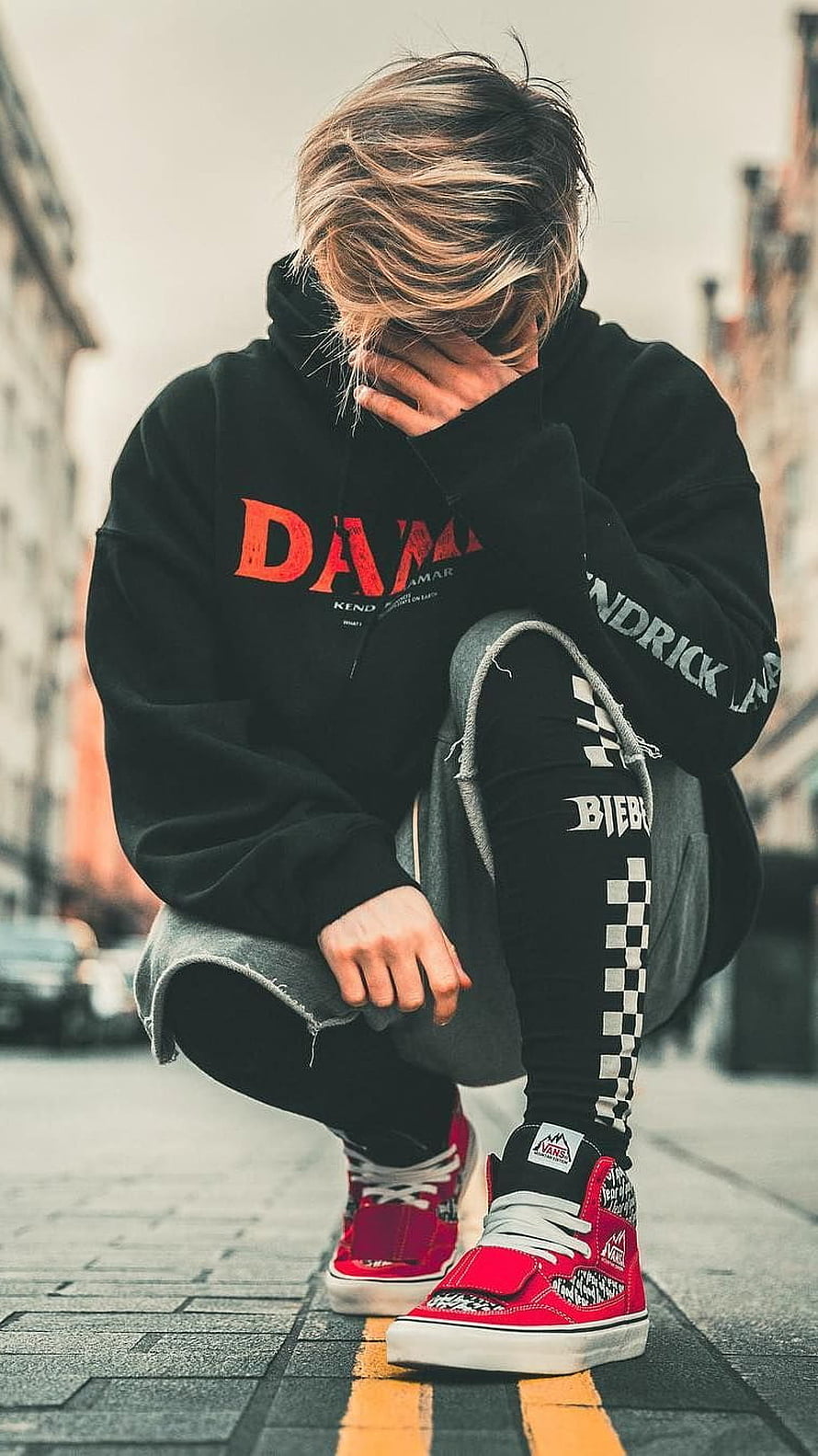 Justin Bieber Street Style Portrait in Black Hoodie and Red Vans HD phone wallpaper