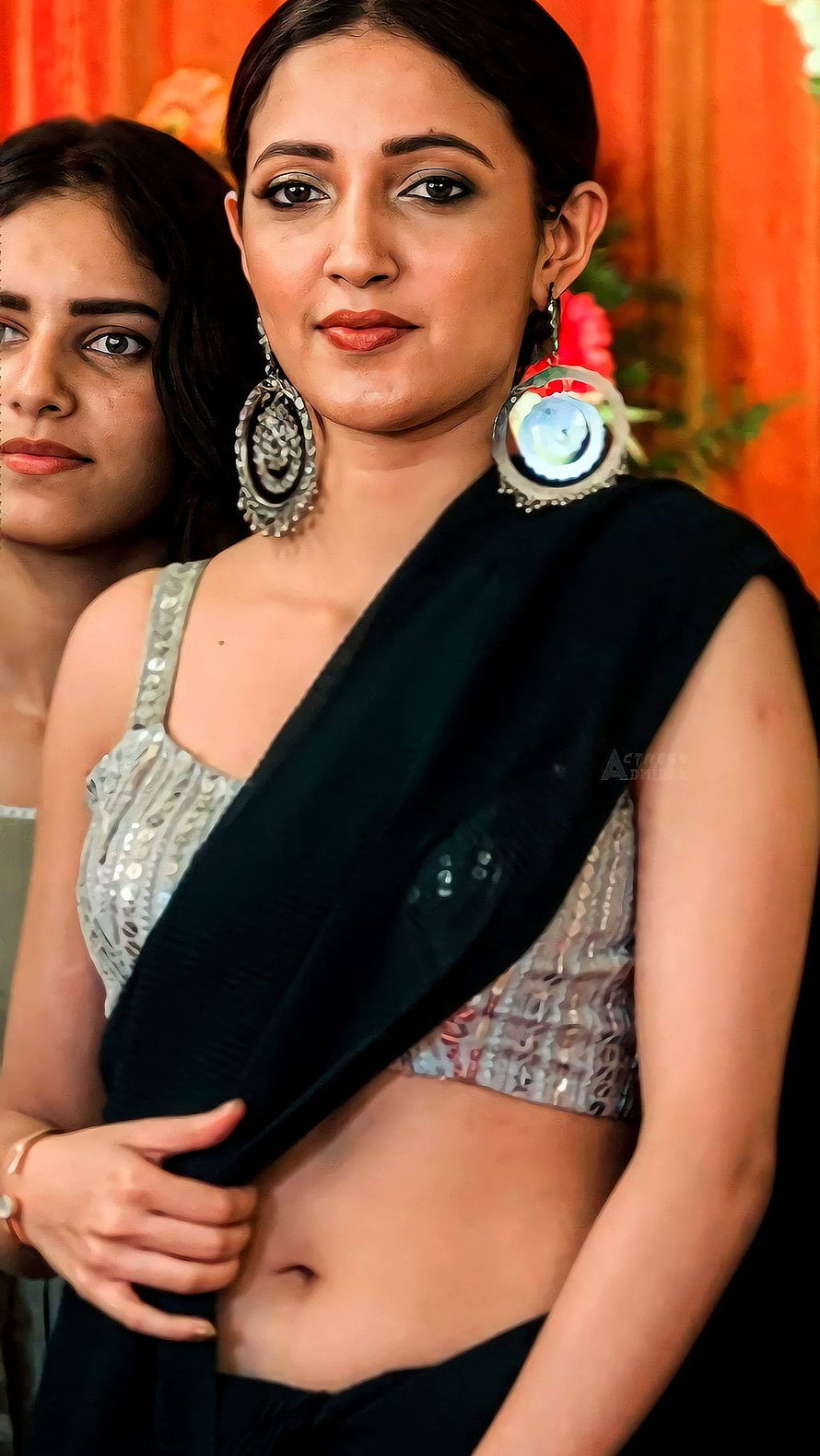 Neha Shetty in Black Saree with Silver Blouse and Statement Earrings HD phone wallpaper