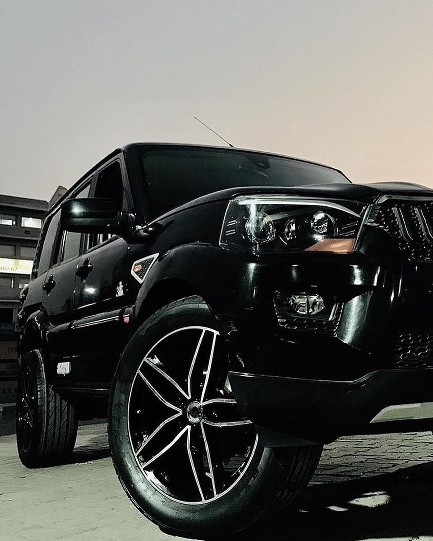 Sleek Black Mahindra Scorpio SUV with Custom Alloy Wheels HD phone wallpaper