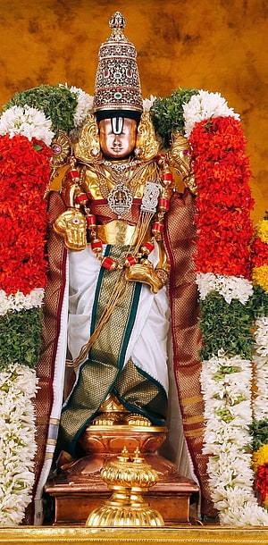 Golden Statue of Lord Ayyappa Adorned with Jewels and Flower Garlands HD phone wallpaper