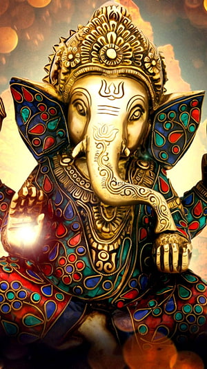 Golden Ganesha Statue with Ornate Jewelry and Vibrant Enamel Details HD phone wallpaper