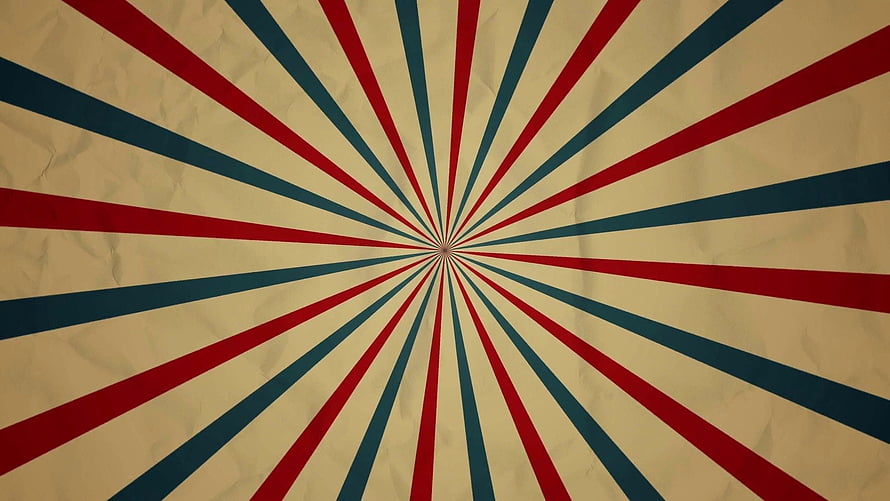 Vintage Circus Sunburst Pattern with Red and Blue Rays on Textured Paper HD wallpaper