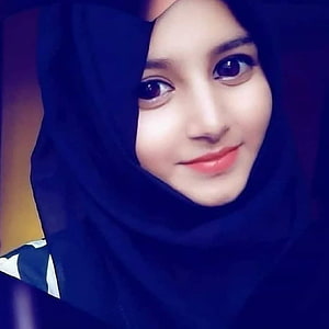 Close-up portrait of a smiling young woman wearing a dark navy hijab with soft lighting, 5,871 Likes, 191 Comments - Sayma Hussain on Instagram: “#keepgoing #keepmotivating #kb in 2020. Muslim girls , Islamic girl, Stylish girl, Beautiful Islamic Girls HD phone wallpaper