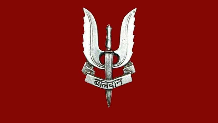Balidaan Emblem Featuring Crossed Swords and Dagger on Deep Red Background HD wallpaper