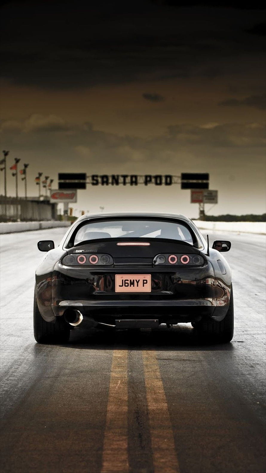 Rear View of Black Toyota Supra MK4 on Race Track at Santa Pod HD phone wallpaper