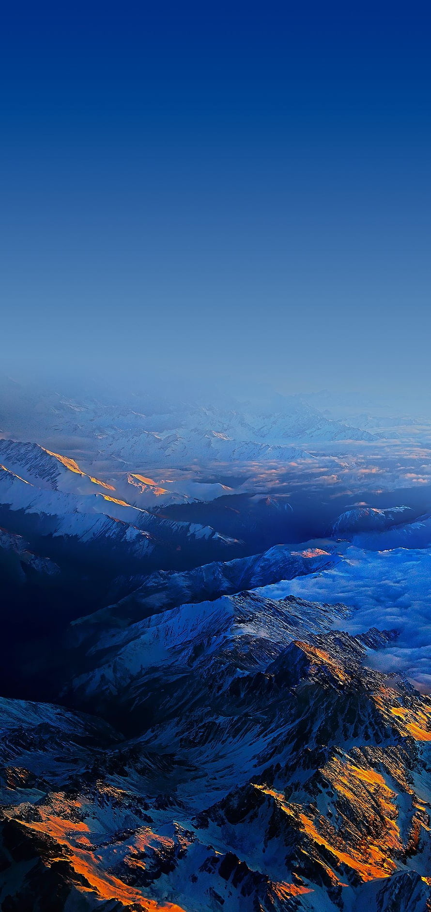 Snow-Capped Mountain Peaks Bathed in Golden Sunrise Light Above Sea of Clouds HD phone wallpaper
