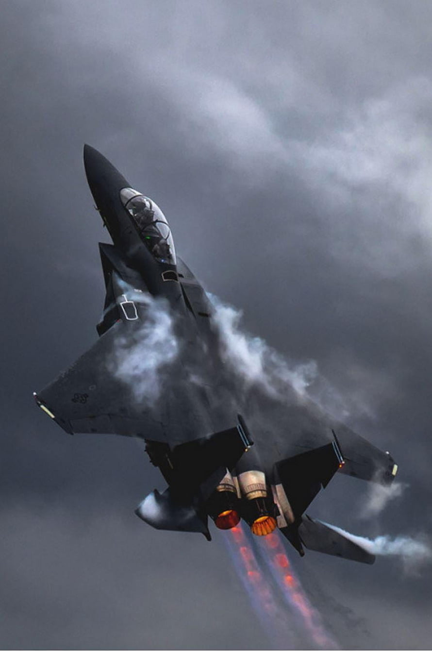 F-15 Eagle Fighter Jet Climbing with Afterburners Engaged in Stormy Sky HD phone wallpaper