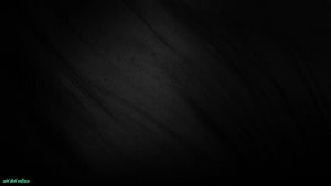 Minimalist Dark Charcoal Texture with Subtle Diagonal Grain and Soft Vignette HD wallpaper