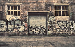 Weathered Brick Wall Covered In Urban Street Art And Wildstyle Graffiti Tags HD wallpaper