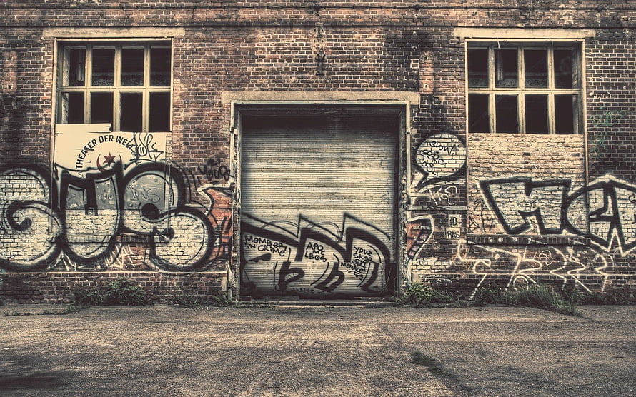 Weathered Brick Wall Covered In Urban Street Art And Wildstyle Graffiti Tags HD wallpaper