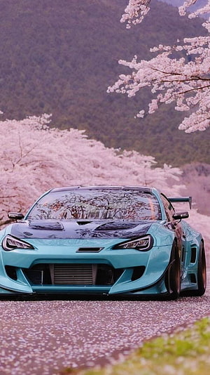 Turquoise Subaru BRZ Widebody with Cherry Blossoms HD phone wallpaper