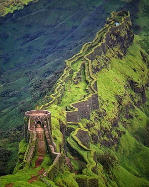 Aerial View of Raigad Fort Ancient Stone Walls Winding Through Lush Green Mountain Ridges HD phone wallpaper