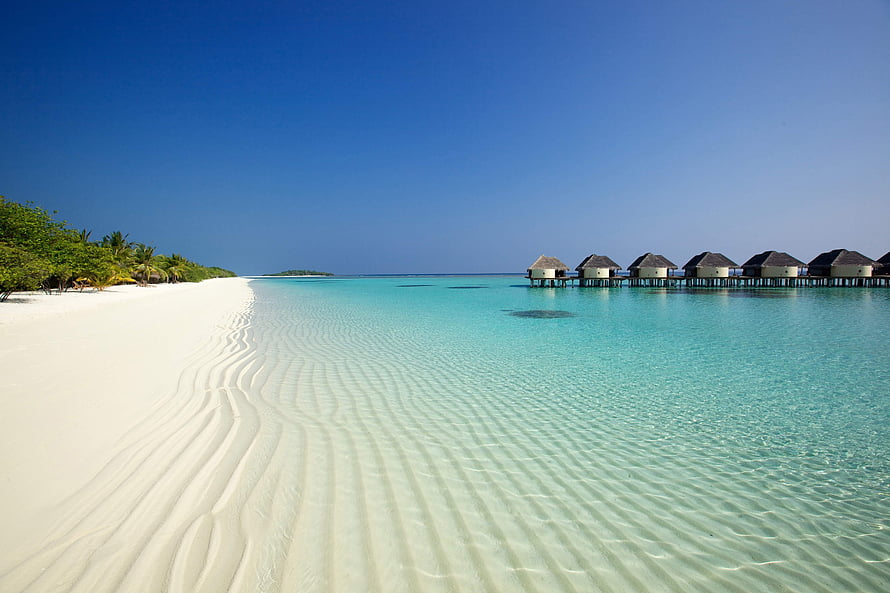 Tropical Paradise With Overwater Bungalows On White Sandy Beach HD wallpaper