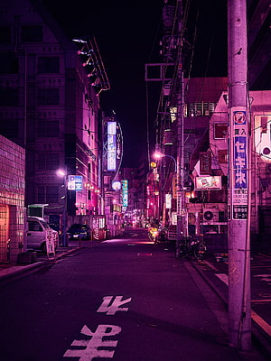 Neon-lit Japanese street at night with purple and pink hues, urban alleyway with glowing signs and parked cars HD phone wallpaper