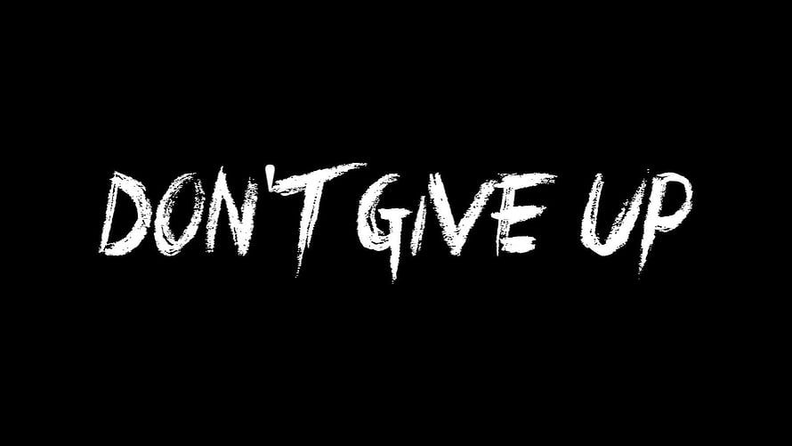 Handwritten Don't Give Up Motivational Quote on Black Background HD wallpaper