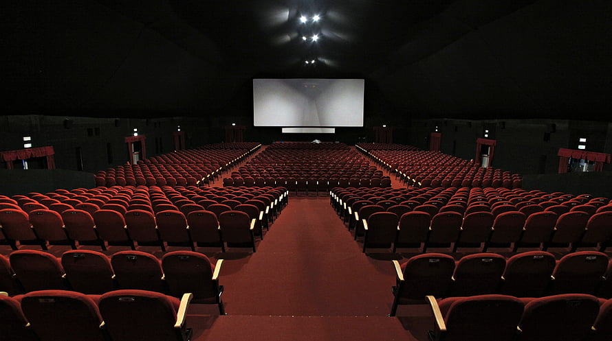 Empty Movie Theater With Red Seats And Large Screen HD wallpaper