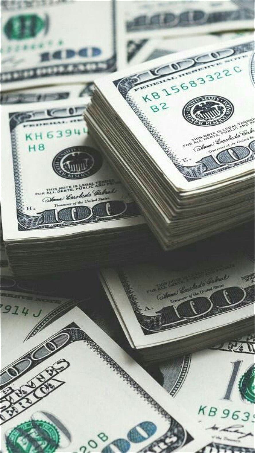 Stacks of One Hundred Dollar Bills Arranged in Neat Piles HD phone wallpaper