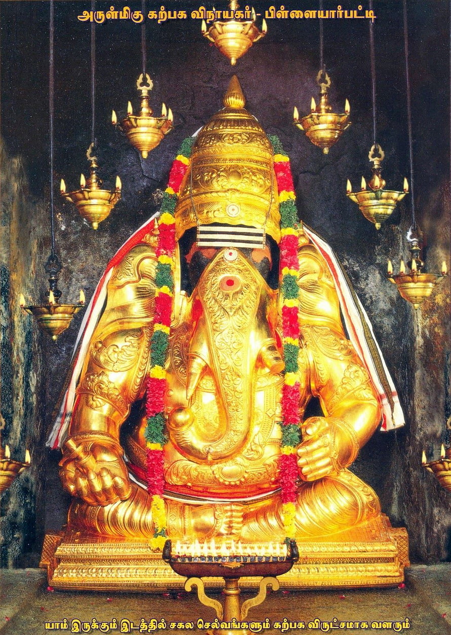 Golden Ganesha Statue in Tiruchirappalli Temple with Hanging Oil Lamps HD phone wallpaper