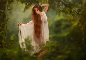 Ethereal Redhead in White Lace Robe Standing in Misty Forest HD wallpaper