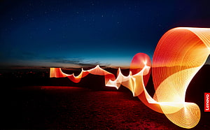 Lenovo Abstract Light Painting Wallpaper With Glowing Orange Ribbons Against A Starry Night Sky HD wallpaper