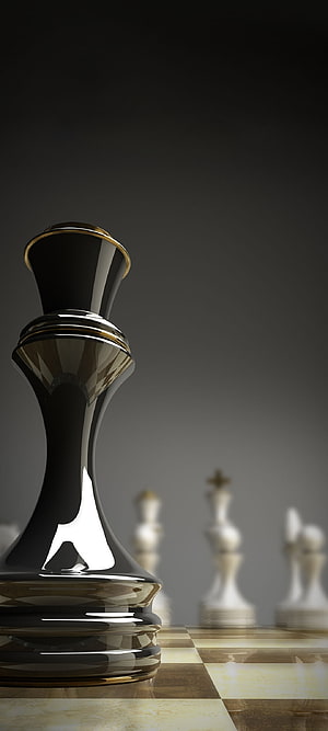 Glossy Black Chess King Piece with Gold Accents on a Marble Board HD phone wallpaper