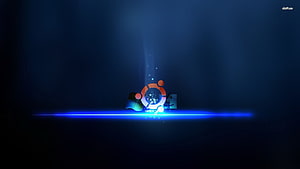 Ubuntu Linux Logo Glowing on a Blue Light Beam Against a Dark Background HD wallpaper