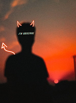 Devil Boy Silhouette With Neon Horns Against Fiery Sunset Sky HD phone wallpaper