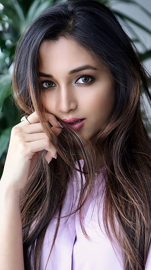 Portrait of Bollywood Actress Yami Gautam with Long Brown Hair and Pink Top HD phone wallpaper