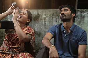 Dhanush and Actress in Emotional Scene from Tamil Film HD wallpaper