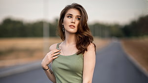Portrait of a Beautiful Woman in Green Top Standing on a Country Road, Girl model, pretty and brunette, gorgeous HD wallpaper