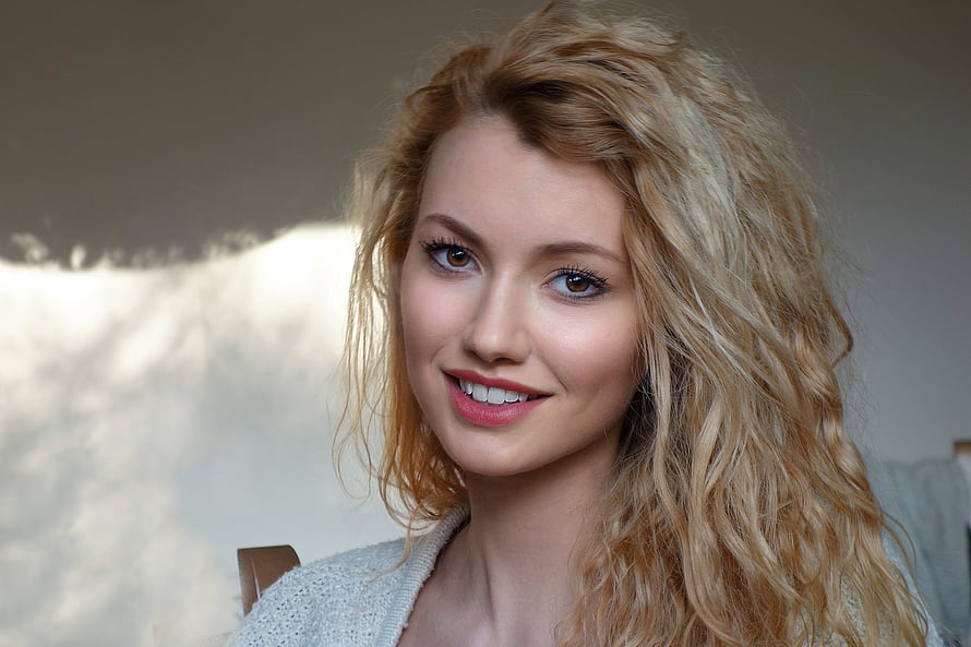 Portrait of a smiling woman with long wavy blonde hair and soft natural makeup, Unknown Model, model, blonde, curly hair, smile, , cute, beautiful, woman, Gorgeous HD wallpaper