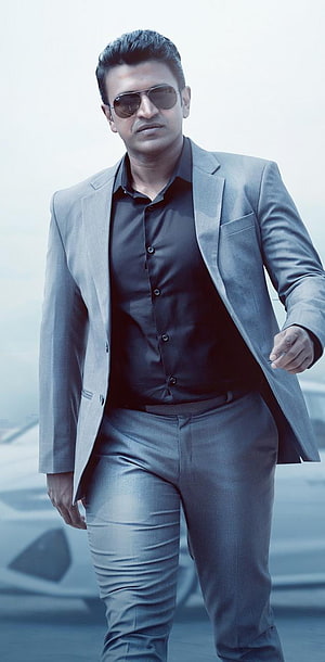 Ranveer Singh in a stylish grey suit and sunglasses walking confidently HD phone wallpaper